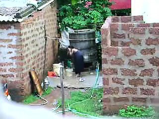 Watch This Two Lankan Lady Getting Bath In Outdoor...