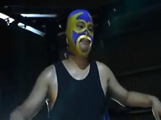 Busty hottie wrestles a masked man and gets her lovely boob