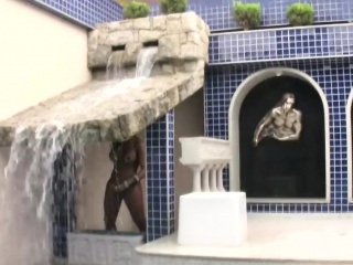 Glamorous blonde TS masturbates long shaft by the waterfall