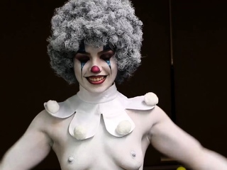 Sexy babe wears clown makeup and...