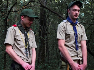 Cute junior scout spies then tries out older scout’s dick