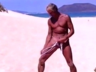 Tanned Guy On Beach In Tiny String Thong Temporarily...
