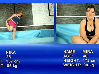 Two fat girls wrestle hard for a fat cock