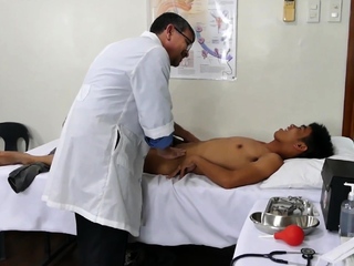 Mature DILF doctor caring for asian twink
