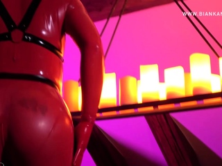 Shemale in Red Latex is Ready to Dominate You