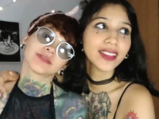 Tattooed Latina amateur lesbians on webcam show