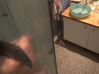 Naked girl shaves her armpits and pubes