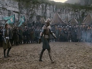 Natalie Dormer approaching a man and pulling her costume off