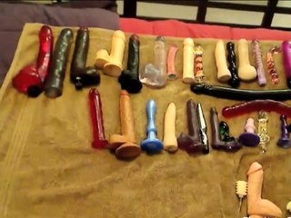 Busty woman in Elvira costume toys