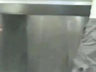 Two gays in a public restroom