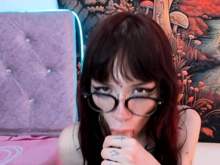 Hot trans sissy demonstrating her dildo blowjob skills