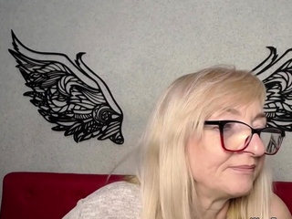 Blonde amateur MILF IngritSno flashing boobs on webcam
