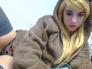 Blonde teen in solo action with her pussy