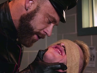 Officer Brogan slaps pinches and strokes David Webbs dick