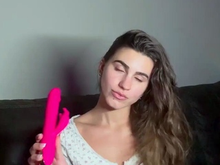 Busty babe playing with her big boobs