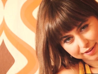 Petite pornstar MILF flaunts perky boobs