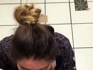 American Amateur Sucks Big Cock in Target Bathroom