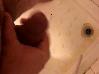 Masturbating and wanking my hard cut cock under the shower