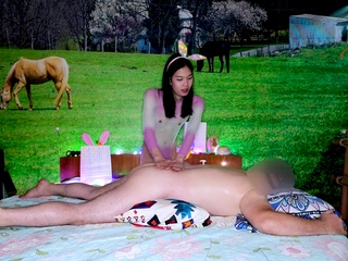 Ladyboy masseus emptying a clients balls